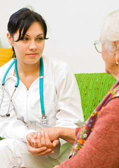 Nurse and elderly woman